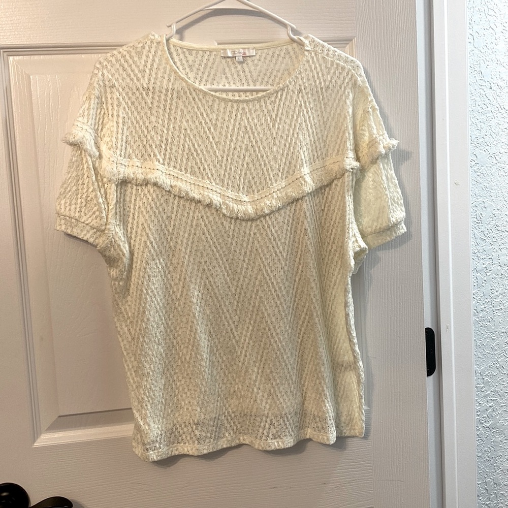 Cream top with fringe. Very boho